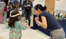 A young participant experiencing virtual reality for the first time at the 2023 Georgia Tech Science and Engineering Day. A young participant experiencing virtual reality for the first time at the 2023 Georgia Tech Science and Engineering Day.